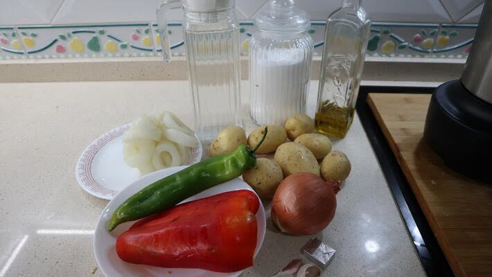 Los ingredientes necesarios para hacer guiso de calamares en Mambo de Cecotec