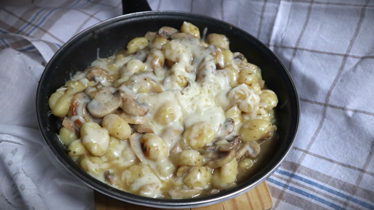 plato servido noqui champinones receta casera